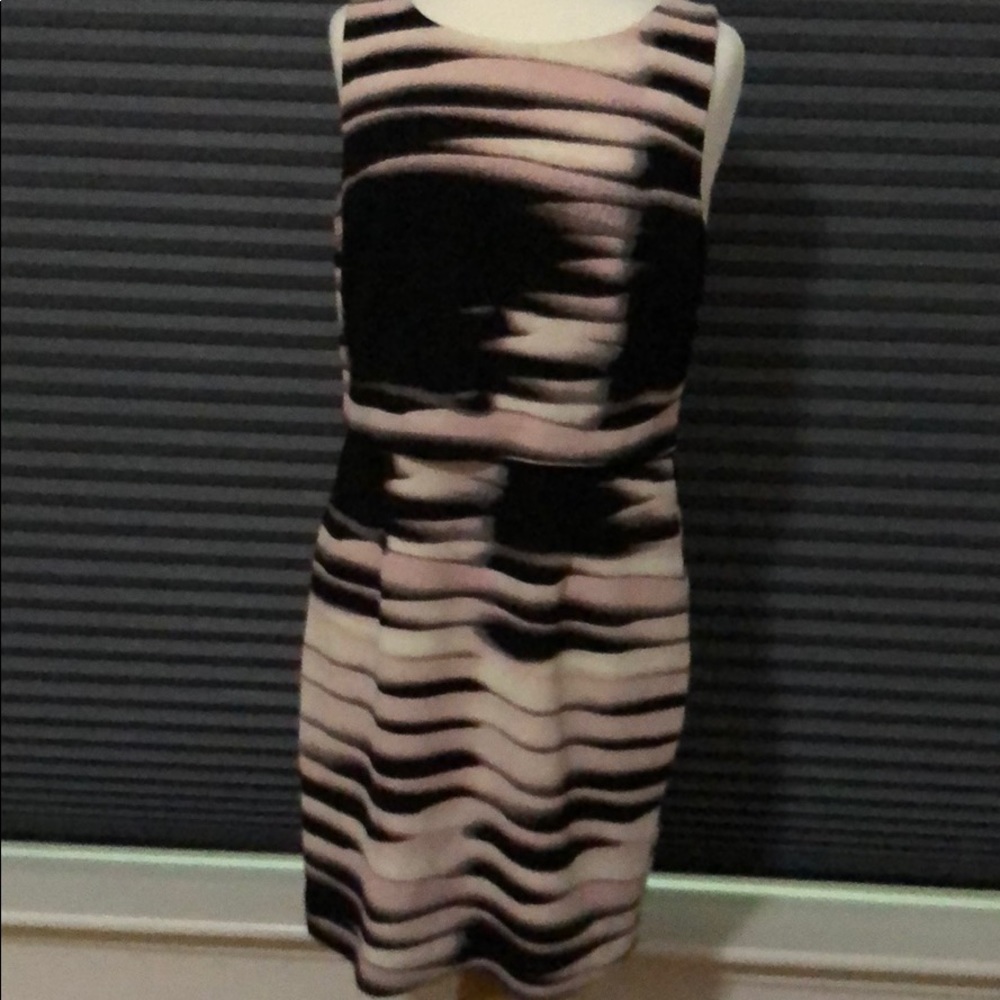 Ivanka Trump sleeveless popover dress.